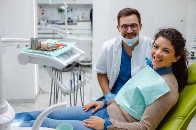 Smiling patient after preventive dental checkup at a clinic in Monett, MO