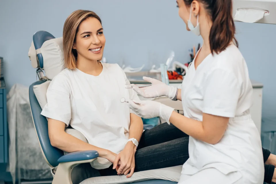 Dental professional speaking with a patient during a general dentistry consultation in Monett, MO
